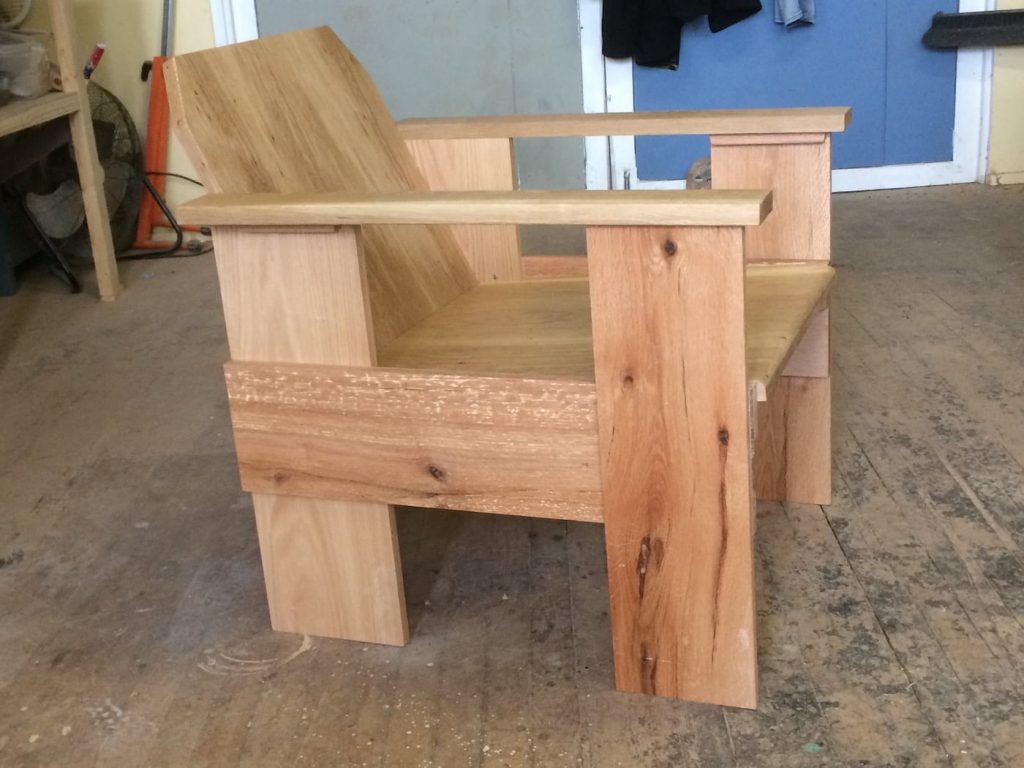 Oak chair made from reclaimed red and white oak with a design inspired by Gerrit Rietveld.
